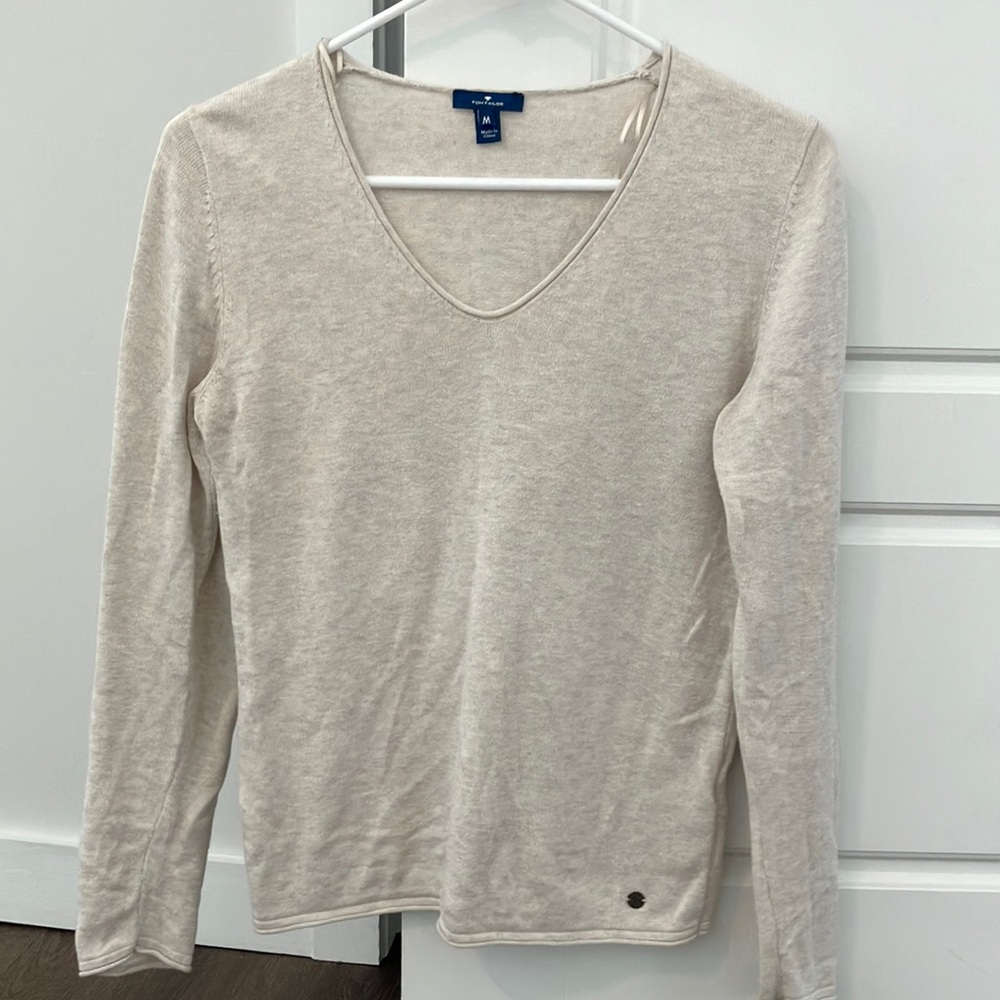 V neck sweater.